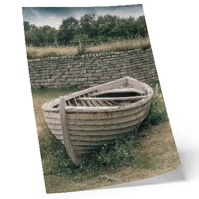 Decorative poster featuring an abandoned boat on a tranquil grassy nature landscape