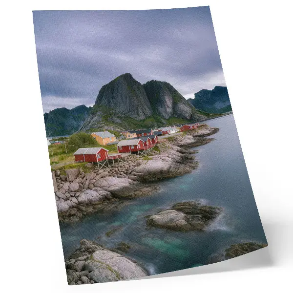 Premium wall art featuring red houses, mountains, and water in a peaceful landscape