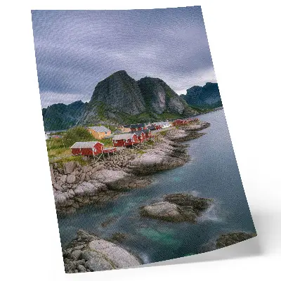 Premium wall art featuring red houses, mountains, and water in a peaceful landscape