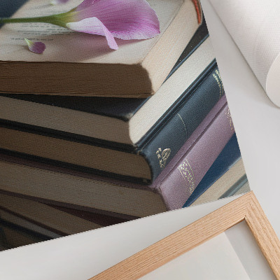 Premium wall art A stack of books with a delicate flower on top