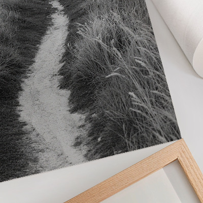 Poster A lighthouse against a background of tall grass