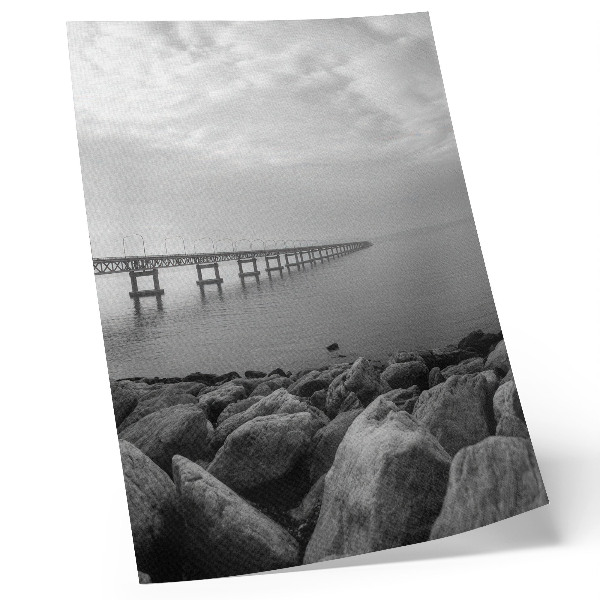Premium wall art Peaceful landscape, bridge, rocky beach, gray sky