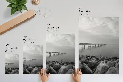 Premium wall art peaceful landscape featuring a bridge over a rocky beach under a gray sky