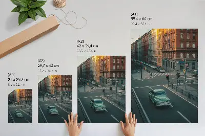 Art print featuring a retro car parked in front of tenement houses at sunset