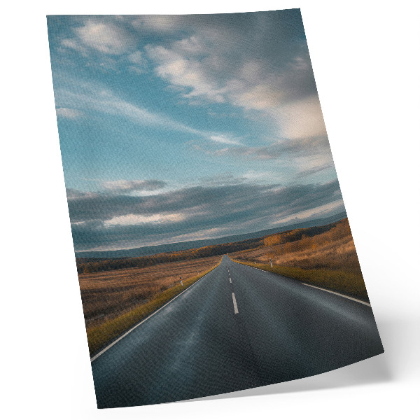 Decorative poster A road through the autumn plain under a blue sky