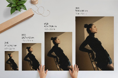 Poster Dark silhouette of a woman, a ray of light, peace