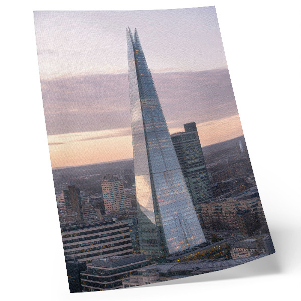 Premium wall art A skyscraper at sunset contrasting with the city