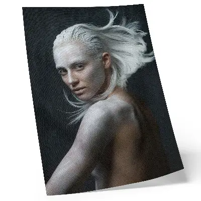 Decorative poster with dark background and delicate white hair focus