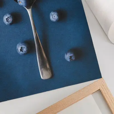 Premium wall art blueberries on a spoon on a blue background