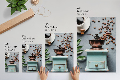 Decorative poster Old turquoise coffee grinder, coffee beans, green leaves