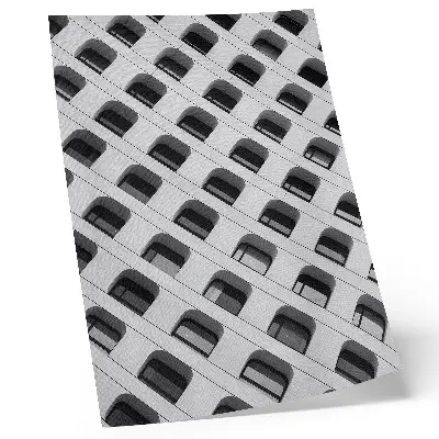 Poster a minimalist facade with repeating geometric shapes