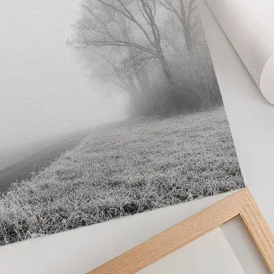 Decorative poster featuring a peaceful winter landscape with subtle fog and trees