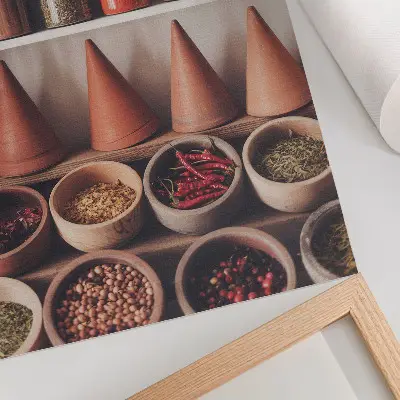 Premium wall art spices in jars with wood and ceramic accents in warm colors