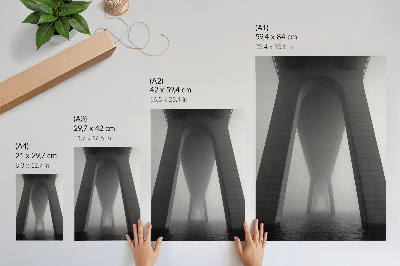 Poster Bridge construction in dense fog near the water