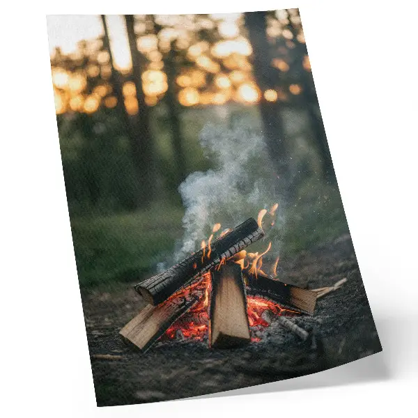 Decorative poster bonfire against a forest and smoke backdrop