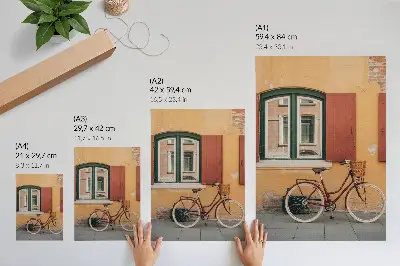 Decorative poster a bicycle against a colorful retro facade