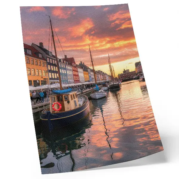 Art print colorful tenement houses with water reflections under a warm sky