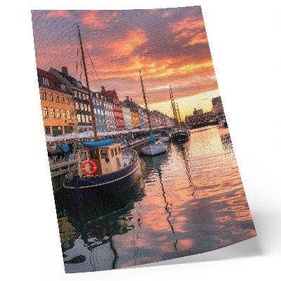 Art print Colorful tenement houses, water reflections, warmth of the sky