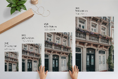 Poster Flowers on the balcony, brick facade, classic style