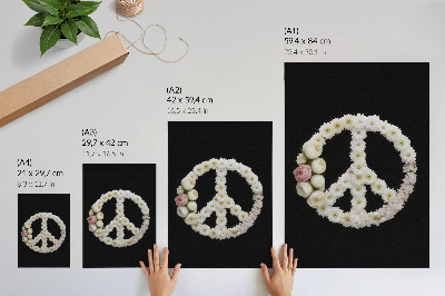 Poster Flowers in the shape of a peace symbol on a black background