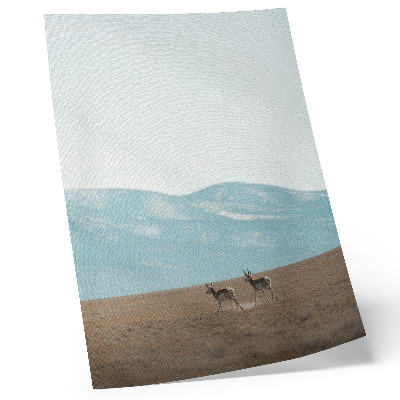 Premium wall art Antelopes against the backdrop of mountains, a peaceful space