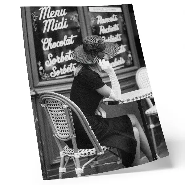 Art print woman wearing a hat at a table in a cafe