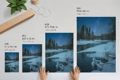 Premium wall art featuring a snowy river landscape with trees under starry skies