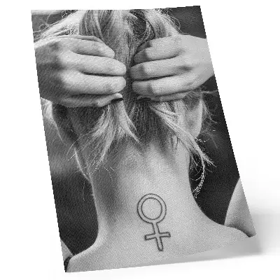 Art print featuring a minimalist black and white symbol of femininity