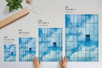 Poster A glass facade reflecting the sky and clouds