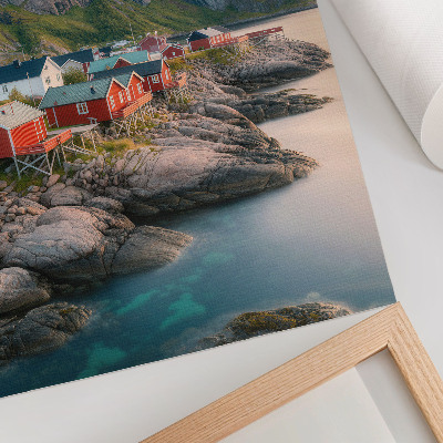 Decorative poster Charming cottages, a calm sea, and majestic mountains