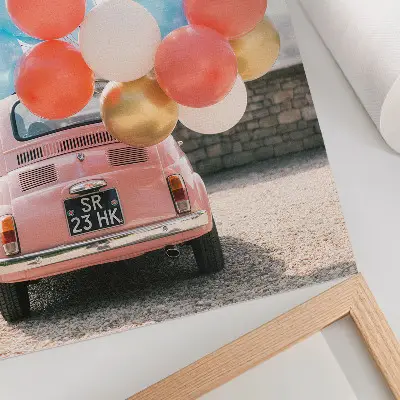 Poster pink car with balloons in a retro background