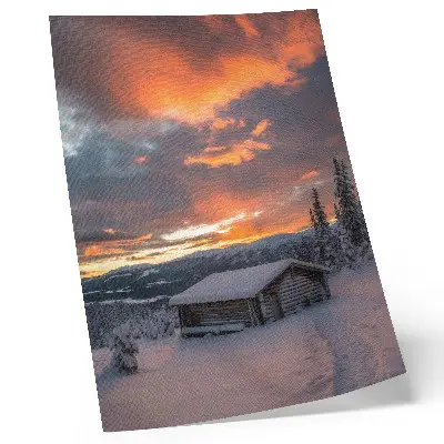 Art print featuring a winter shelter under an orange sky