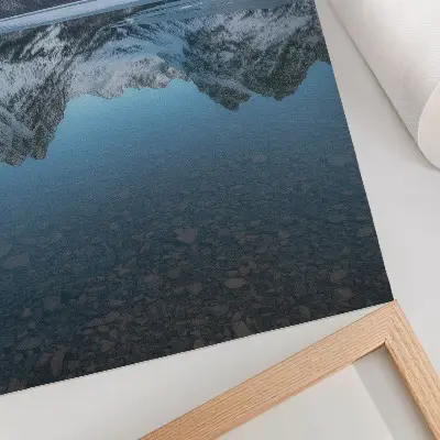 Decorative poster symmetrical winter mountains reflected in a lake