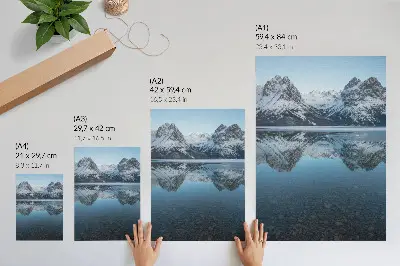 Decorative poster symmetrical winter mountains reflected in a lake