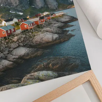 Art print featuring a sunset over red houses by the fjord and mountains