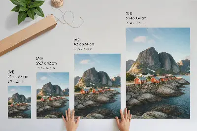Art print featuring a sunset over red houses by the fjord and mountains