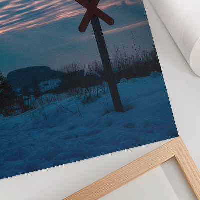 Poster Atmospheric winter landscape, colorful clouds, lonely sign