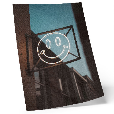 Premium wall art Neon face against a brick wall