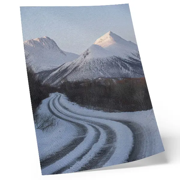 Poster winter landscape featuring a beautiful winding mountain road
