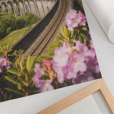 Premium wall art stone viaduct in green hills with pastel flowers