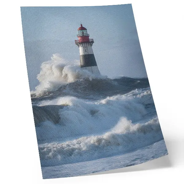 Poster waves hitting the lighthouse featuring high contrast power of nature imagery