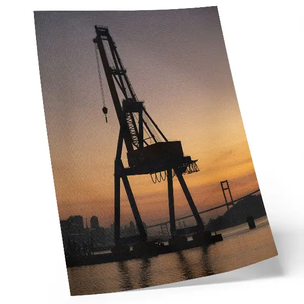 Premium decorative wall art industrial crane silhouette at sunset on a bridge