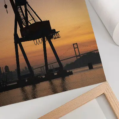 Premium decorative wall art industrial crane silhouette at sunset on a bridge