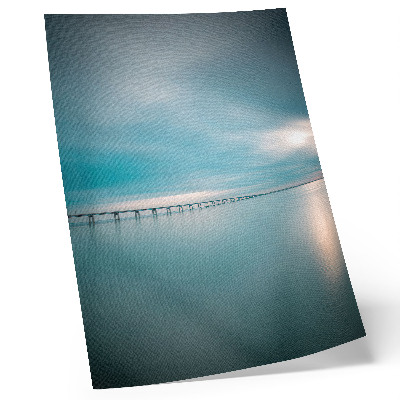 Poster A bridge over calm blue waters