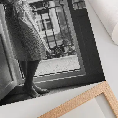 Premium wall art person at the window with a cup of coffee for a peaceful atmosphere