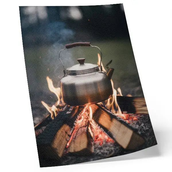 Art print featuring a metallic kettle with wood flames and nature imagery