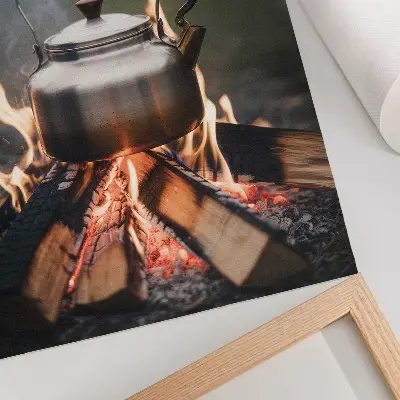 Art print featuring a metallic kettle with wood flames and nature imagery