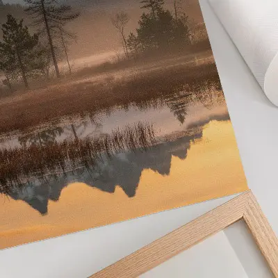 Art print featuring mountains, trees, and fog over calm reflective water