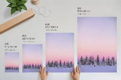 Decorative poster featuring winter trees under a moody pastel sky