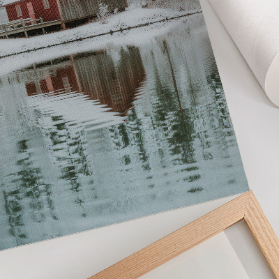 Art print A red cottage among snowy trees by the water